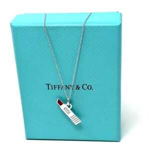 Authentic Tiffany & co Enamel red Lipstick Penda Necklace.